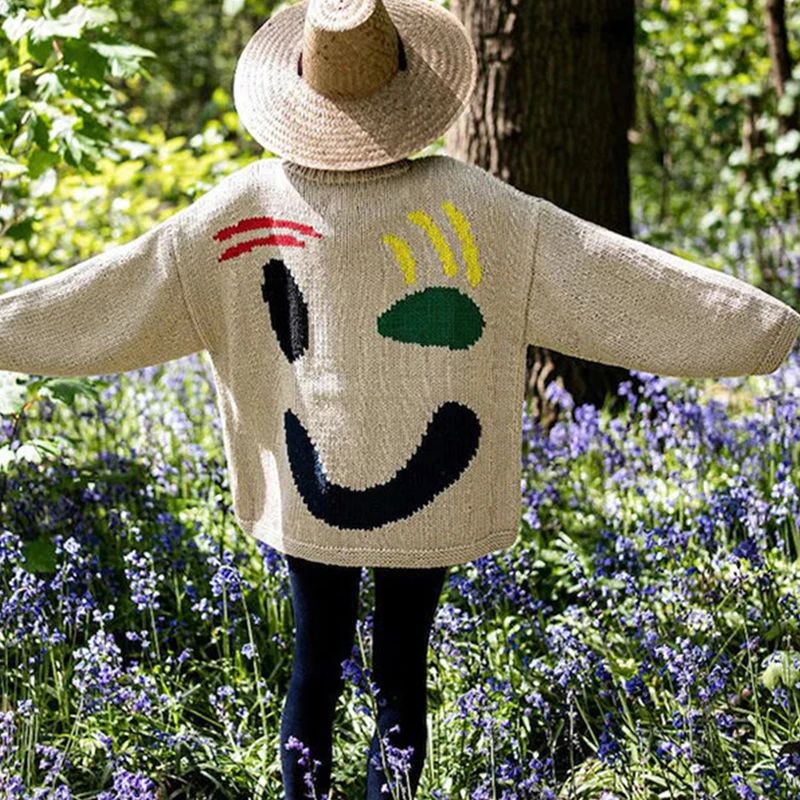 Oversized sweaters with smiley face design